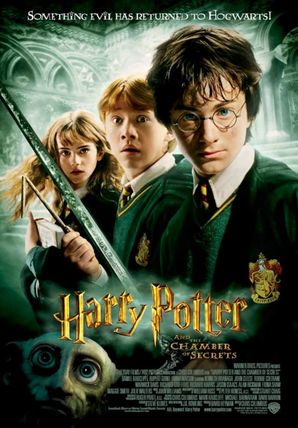 Two figures before the stone face of Salazar Slytherin
