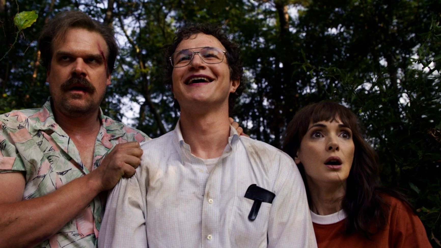 Hopper, Alexei and Joyce standing together looking upward