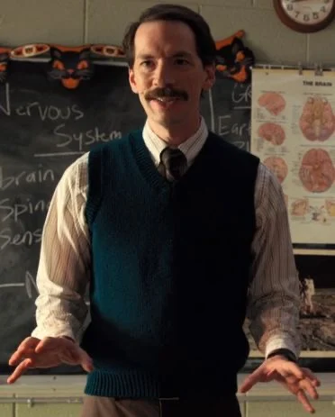 Mr Clarke teaching in front of a blackboard